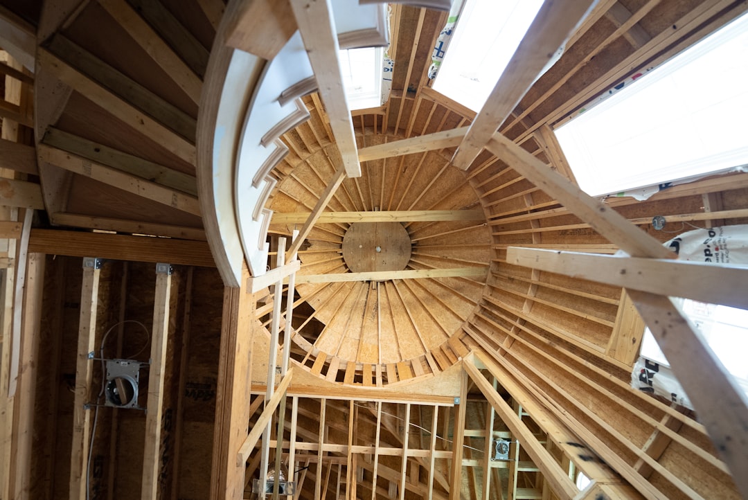 a-wooden-ceiling-with-a-fan-s3nwpc5nufy